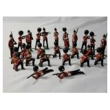 25-Vintage Red and Black Precast British Soldiers in battle. - Made by JO/HILLCO in the 50