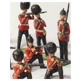25-Vintage Red and Black Precast British Soldiers in battle. - Made by JO/HILLCO in the 50