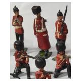 25-Vintage Red and Black Precast British Soldiers in battle. - Made by JO/HILLCO in the 50