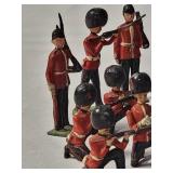 25-Vintage Red and Black Precast British Soldiers in battle. - Made by JO/HILLCO in the 50