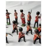 25-Vintage Red and Black Precast British Soldiers in battle. - Made by JO/HILLCO in the 50
