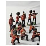 25-Vintage Red and Black Precast British Soldiers in battle. - Made by JO/HILLCO in the 50
