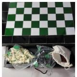 21" x 21"  Checker board/Chess set with green and white tiles. Board had pullout drawer that hold the included chess and checker pieces.