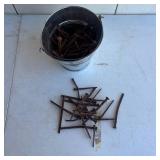 Old lock and Bucket of Old Nails