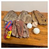 Lot Gloves - Baseball/Softball gloves, one baseball, two plastic baseballs, 1 Padded Toddler Glove