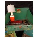 Collection of Camping Equipment with Coleman Stoves and Accessories