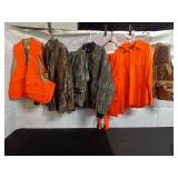 Collection of Hunting Apparel including Vests, Jacket, and Shirts