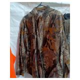 Collection of Hunting Apparel including Vests, Jacket, and Shirts