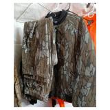 Collection of Hunting Apparel including Vests, Jacket, and Shirts