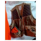 Collection of Hunting Apparel including Vests, Jacket, and Shirts