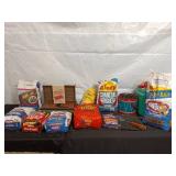 Collection of Charcoal Briquets and Grilling Supplies