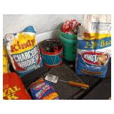 Collection of Charcoal Briquets and Grilling Supplies