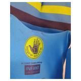 Collection of Assorted Life Jackets and Vests