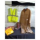 Assorted Workwear Including Carhartt Coveralls, Safety Vest, Boots, and Rain Suit