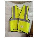 Assorted Workwear Including Carhartt Coveralls, Safety Vest, Boots, and Rain Suit