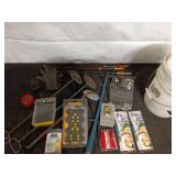 Collection of Ice Fishing Tools and Accessories