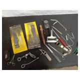 Assorted Fishing and Outdoor Tools with Knives