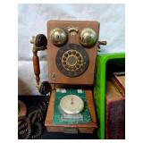 Vintage Rotary Telephone, Classic Lamp, and Assorted City Directories with Greeting Cards