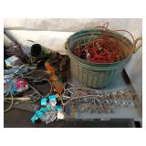 Assorted Pet Supplies Including Chains, Leashes, and Accessories