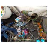 Assorted Pet Supplies Including Chains, Leashes, and Accessories