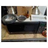 Assorted Household Items Including Lamps, Microwave, and Frames