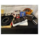 Vintage Music Collection Including Vinyl Records, Cassette Tapes, and More