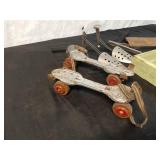 Vintage Metal Roller Skates and Shoe Stretchers with Wooden Tray