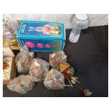 Collection of Decorative Items Including Figurines, Lamps, and Floral Arrangements