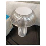 Collection of Decorative Items Including Figurines, Lamps, and Floral Arrangements