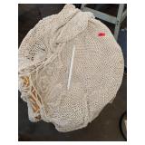 Collection of Garage Items: Folding Chairs, Bicycles, and Hand Trucks