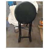 Collection of Garage Items: Folding Chairs, Bicycles, and Hand Trucks