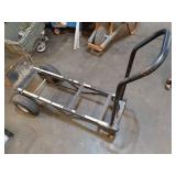 Collection of Garage Items: Folding Chairs, Bicycles, and Hand Trucks