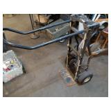 Collection of Garage Items: Folding Chairs, Bicycles, and Hand Trucks