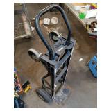 Collection of Garage Items: Folding Chairs, Bicycles, and Hand Trucks