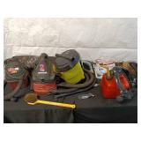 Collection of Garage Items: Folding Chairs, Bicycles, and Hand Trucks