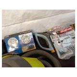 Collection of Garage Items: Folding Chairs, Bicycles, and Hand Trucks