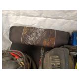 Collection of Garage Items: Folding Chairs, Bicycles, and Hand Trucks