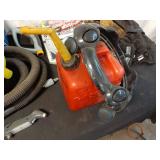 Collection of Garage Items: Folding Chairs, Bicycles, and Hand Trucks