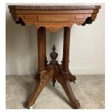 Victorian Hand Carved Parlor Table on Wheels with Marble Top
