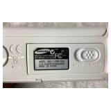 Sony 8 Digital Handycam (Model No. 740) with carrying case and Samsung HMX T10 Camcorder with carrying case