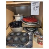 Collection of Baking and Cookware Items in Cabinet