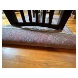 Intricately Patterned Area Rug with Fringed Edges