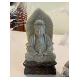 Stone Buddha Statue and Three Wise Men Figurines