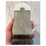 Stone Buddha Statue and Three Wise Men Figurines