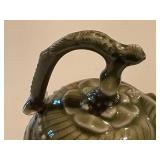 Intricately Carved Green Ceramic Teapot with Dragon Lid