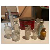Collection of Vintage Glass Bottles and Mackintosh