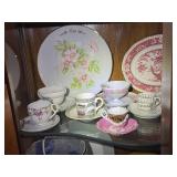 Collection of Vintage Porcelain Teacups and Plates with Floral and Scenic Designs