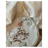 Collection of Unfinished Embroidery Projects with Floral Designs