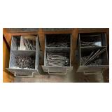 Multi Drawer Nail Cabinet Filled with a Variety of Many Kinds of Nails