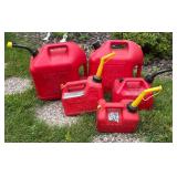 Five 1, 1.5 and 5 Gallon Gas Cans